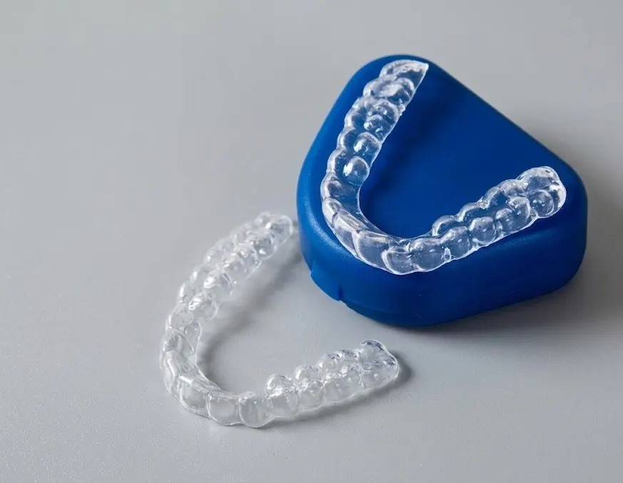 Clear vacuum-formed orthodontic retainers with storage case